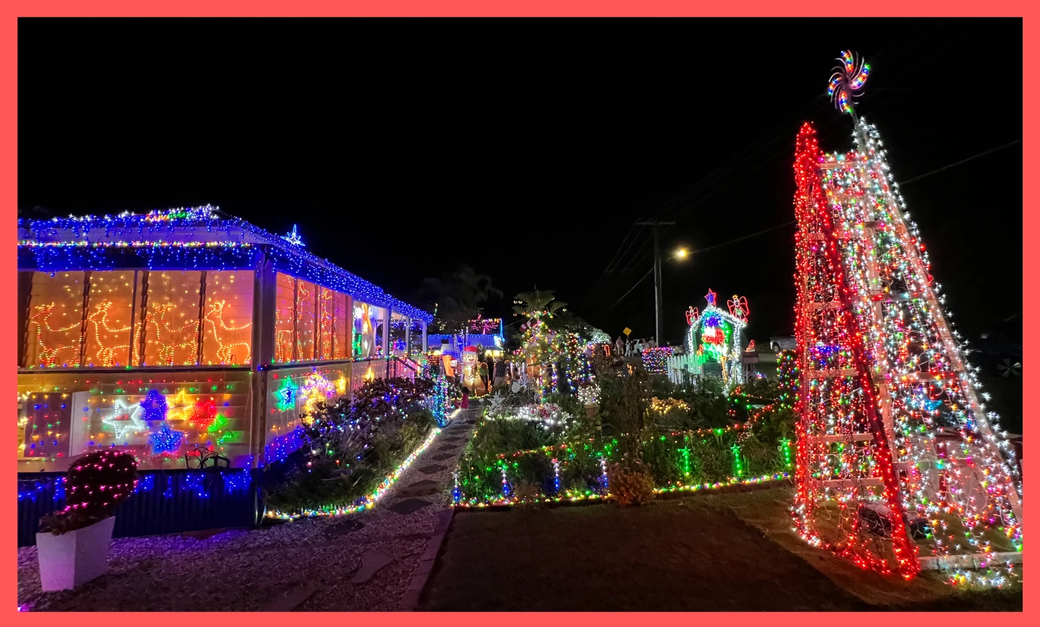 Side view of 24 Pommer Street Christmas lights looking north along the street